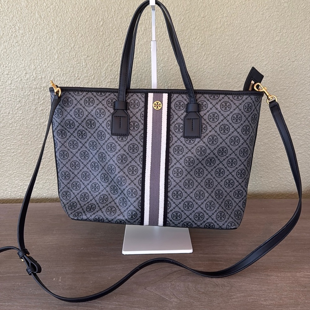 Tory Burch T Monogram coated canvas tote. Top zip closure,top carry handle.